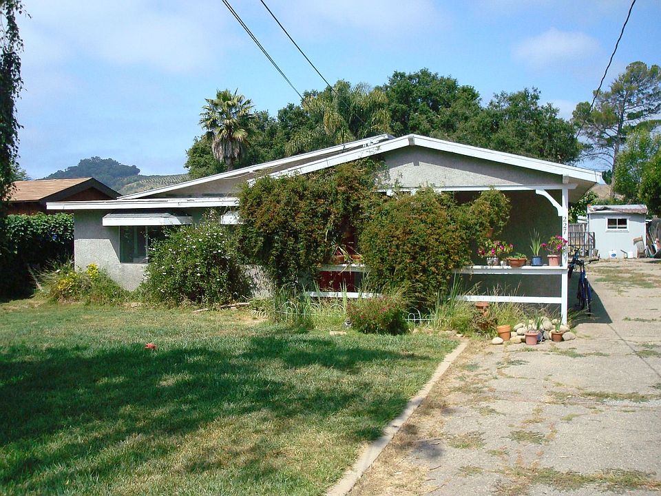 Home sits on deep 10,000+ sq ft lot & backs to Ojai Valley bike trail.