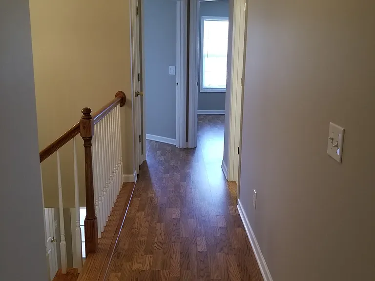 UPSTAIRS HALLWAY VIEW LOOKINBG TOWARDS TWO FRONT BEDROOMS