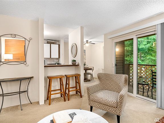 Living room connects to a private deck.
