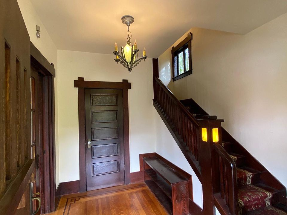 Foyer, beautiful wood work throughout the house