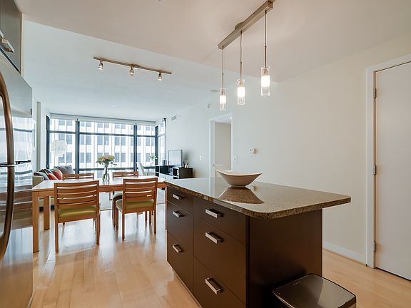 Kitchen features granite countertops