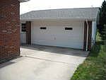 2 1/2 car garage with concrete floor