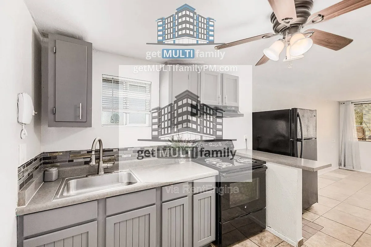 Building Photo - 1402 W Mercer Ln #3