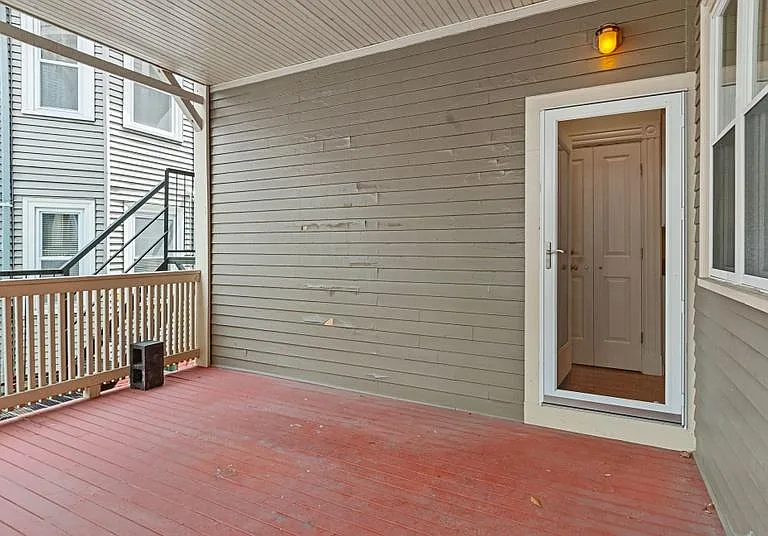 Huge private porch for this unit only. Use curtains and lights to decorate to your style