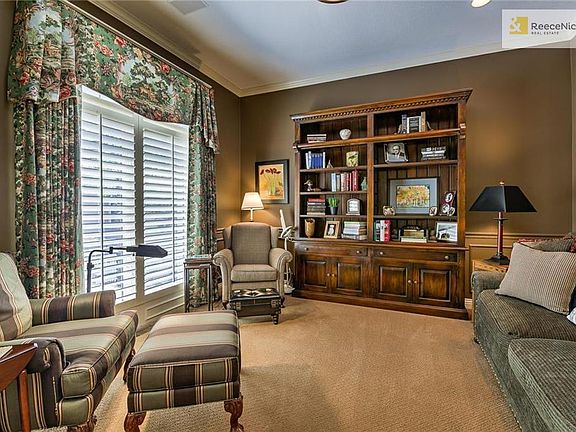 Custom Draperies which are a touch of elegance & style. Main floor study / reading room is private and inviting.