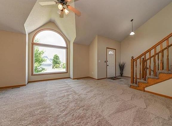 Enter Your New Home Into This Spacious Great Room With Lots Of Light, New Carpet And Paint.