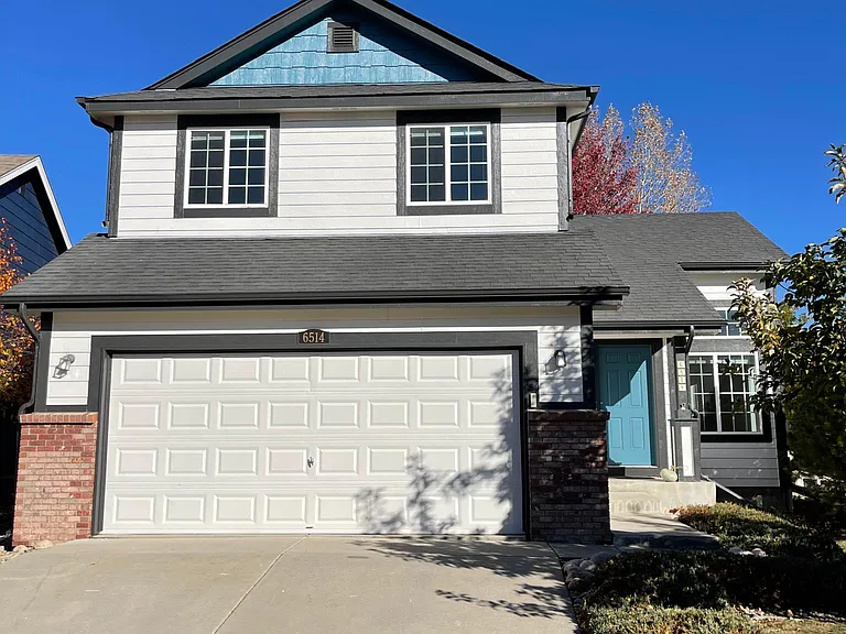 The top peak of this home will be re-painted white.