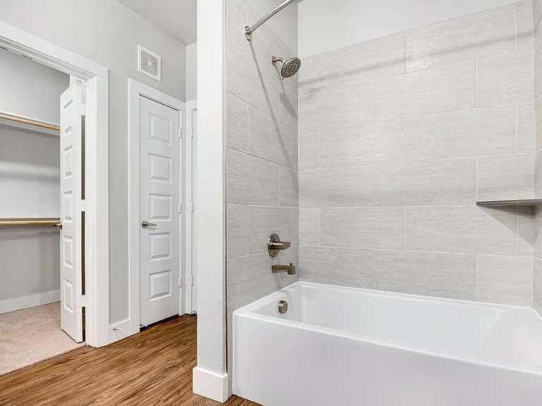 Ceramic tile bathrooms with spacious soaking tubs.