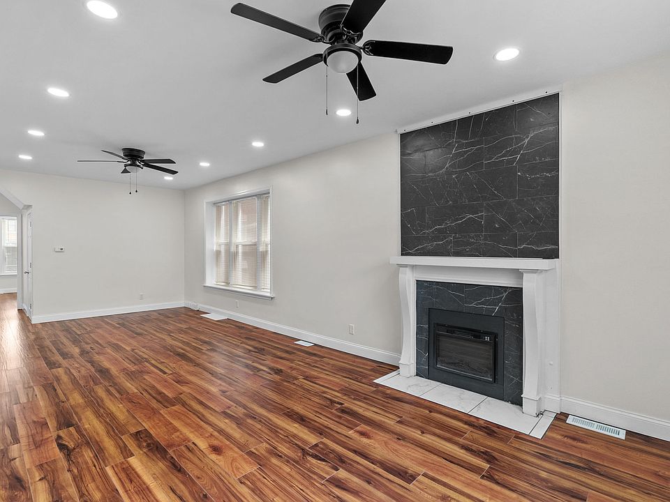 Spacious Living Room with Fireplace