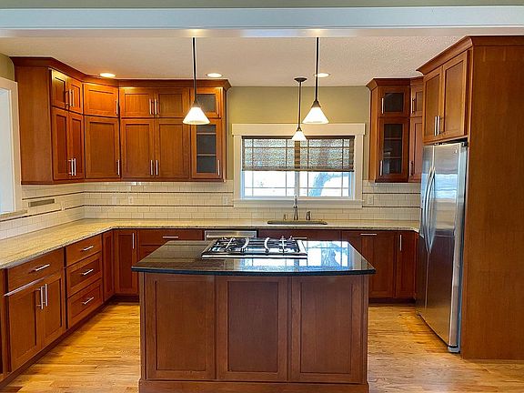 Kitchen includes gas stove/oven and Bosch dishwasher.