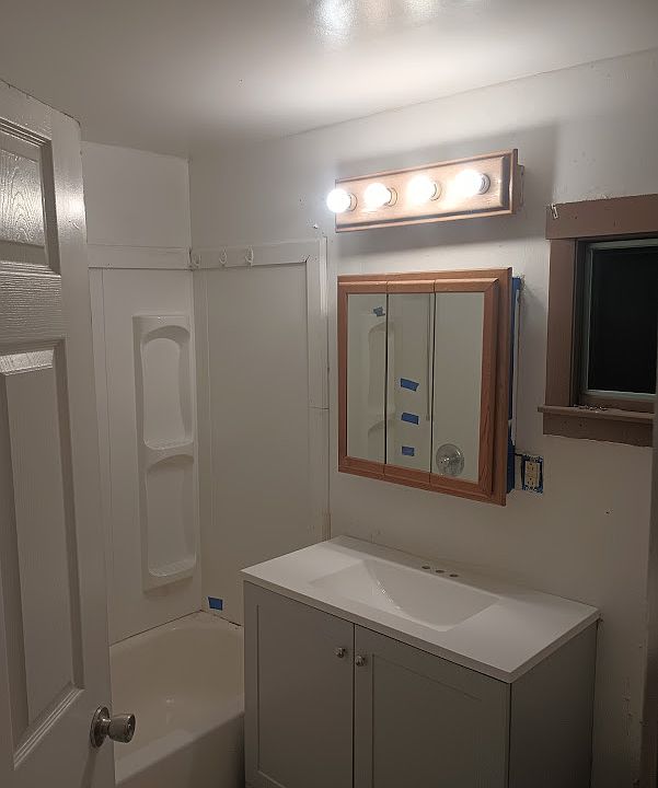 bathroom with new vanity