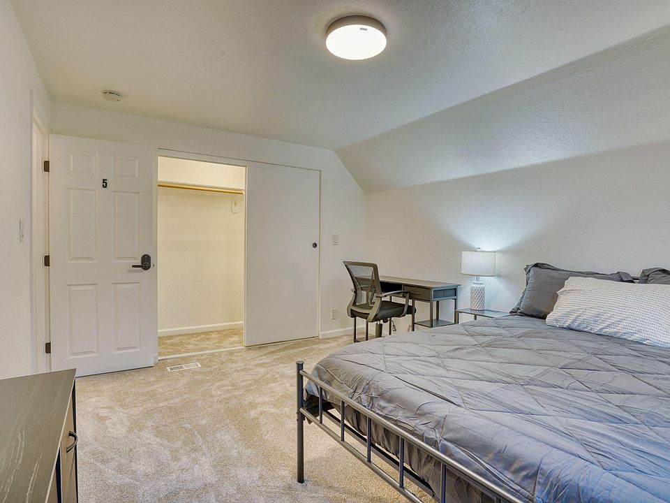 This room offers a large closet and plenty of space for rest and relaxation.