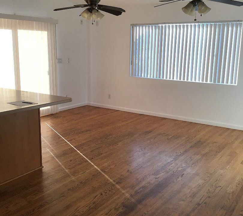 Living Room with sliding glass door leading to private deck.