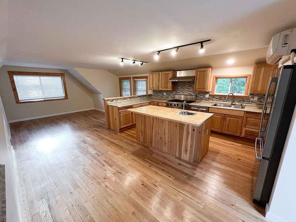 Open floor plan kitchen, dining, living room