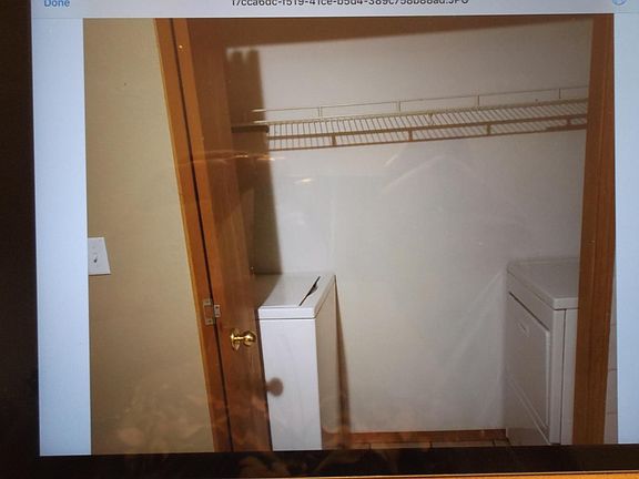 Laundrry closet with washer and dryer.