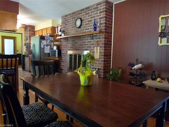 Dining area off Kitchen with hardwood floors and patio doors to back deck.