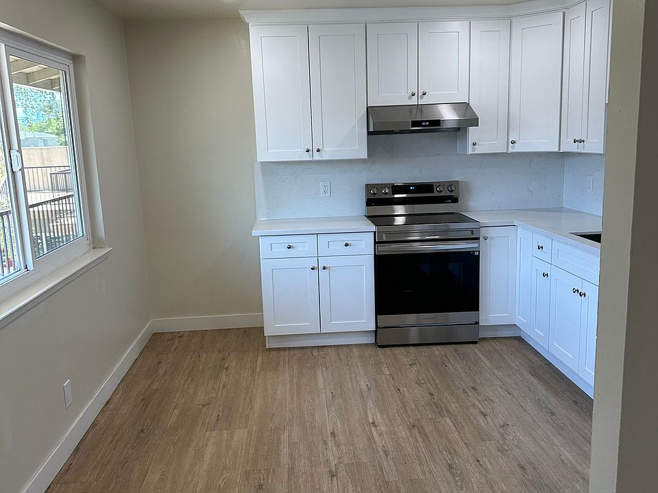 Eat in kitchen seats six, room for your high tech extra shelving or small desk, double pane window, new wood blinds.