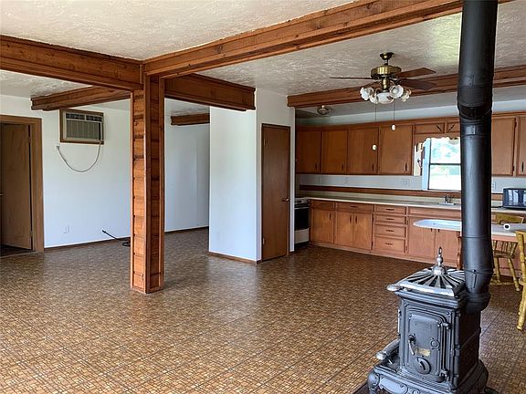 A view showing how open this space is looking towards the kitchen. Imagine what you can do with all this space!