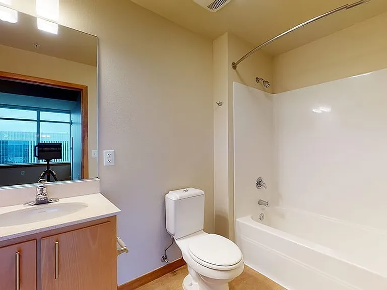 Apartment Bathroom with large soaking tub.