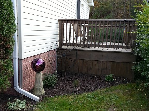 Side deck, west end of home