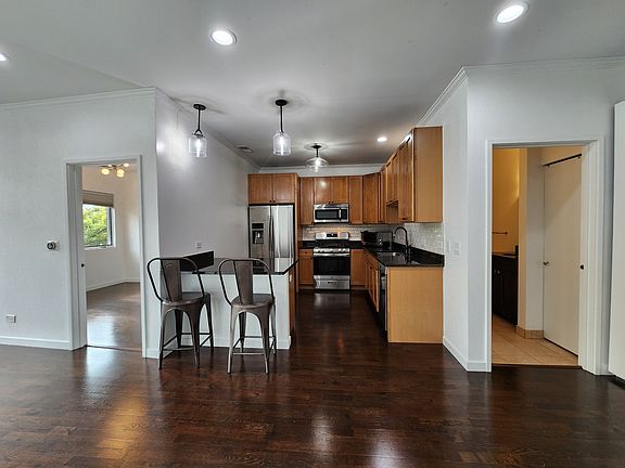 Kitchen (first bedroom to right and bathroom to left)