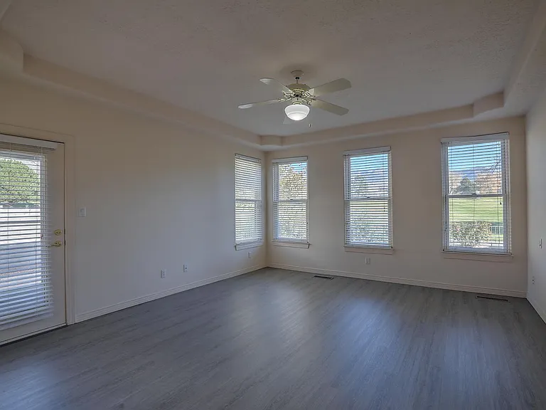 Primary Bedroom with private door to back patio