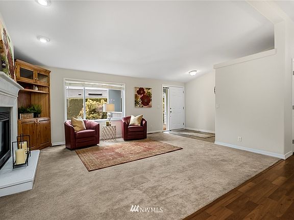 Lovely living room is open and bright