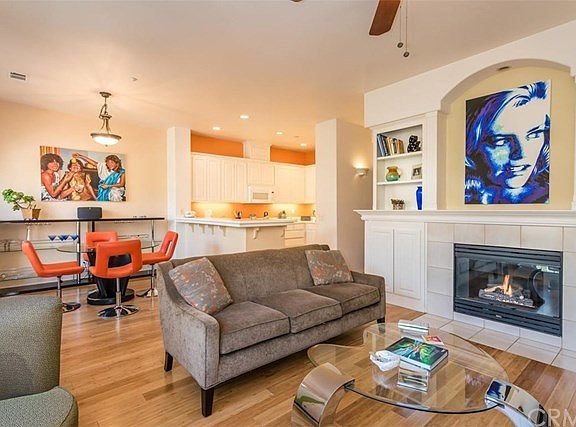 Open concept floor plan, recessed lighting and bamboo flooring can be appreciated throughout the fir