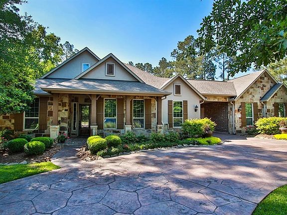 153 Elk Trace Parkway,  a well maintained 4163 square foot one-story home with a circular driveway for easy access, and offers a four car garage.