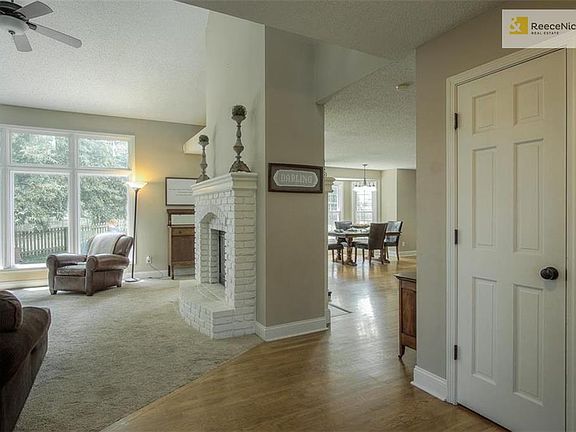 Front entry looking right into Hearth Room & Kitchen - Coat Closet and Half Bath on your right.