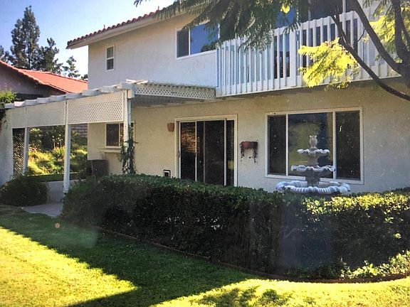 Backside of house balcony is off Master Bedroom Suite. Sit out side and enjoy the view.