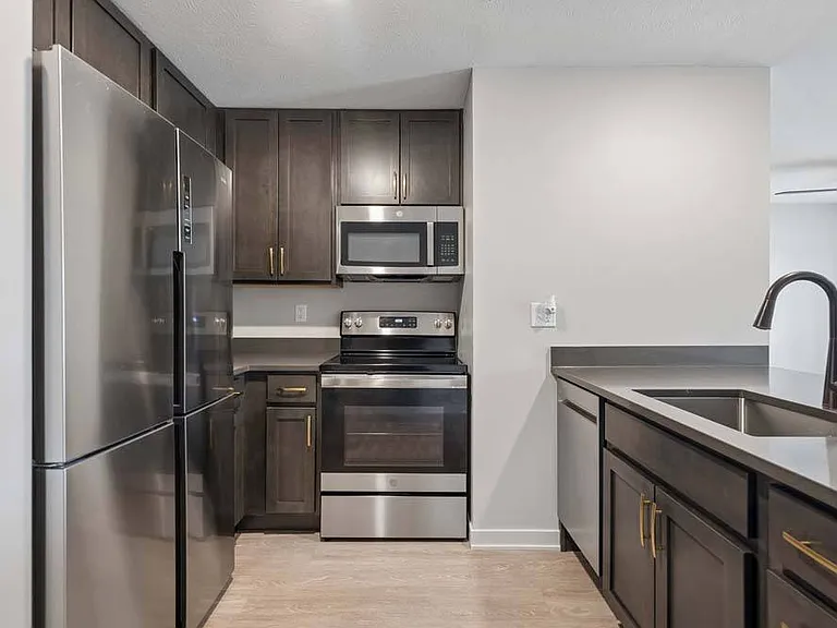 Clean design meets everyday practicality in a kitchen that brings modern style and effortless functionality together.