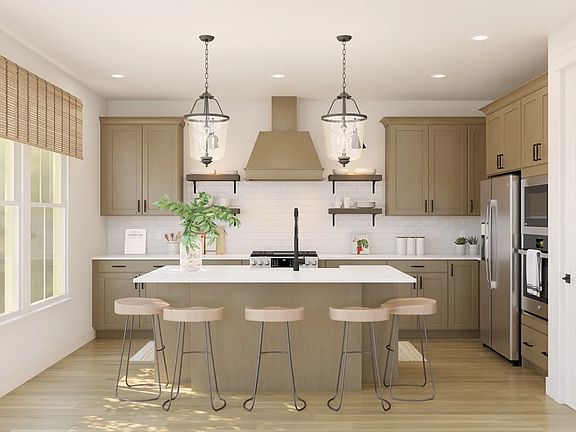 Kitchen with pendant lights quartz countertops
