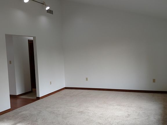 Living Room w/ Cathedral Ceiling: 17'3" x 13'4"