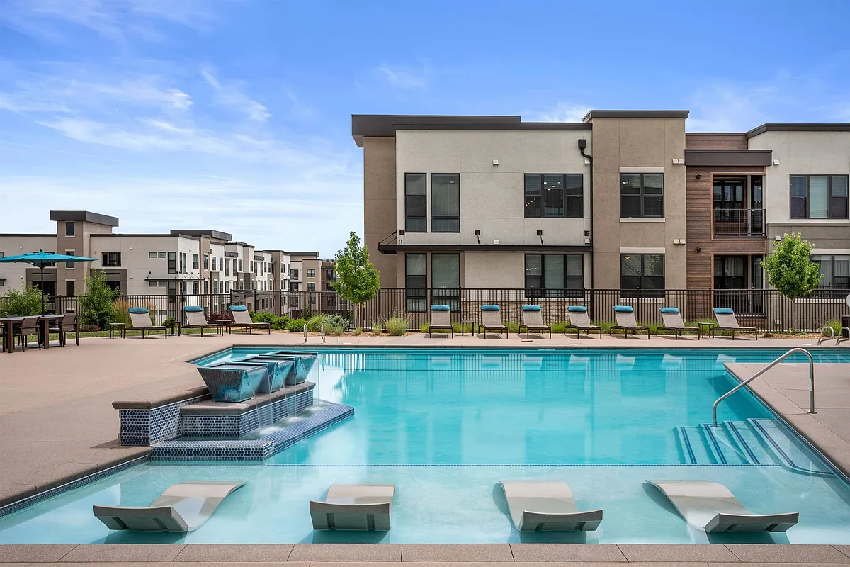 Sparkling Pool with In-Pool Loungers and Relaxing Deck Seating - Gateway Arvada Ridge
