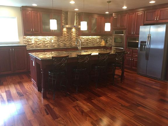 Kitchen w/ 9' Island with enclosed Wine Chiller and Dish was