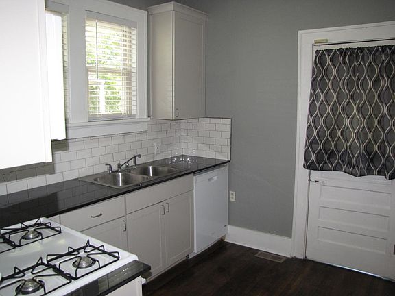 New cabinets, gas stove/oven, dishwasher & tile backsplash