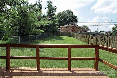 Each unit has fenced backyard. This is the left side.