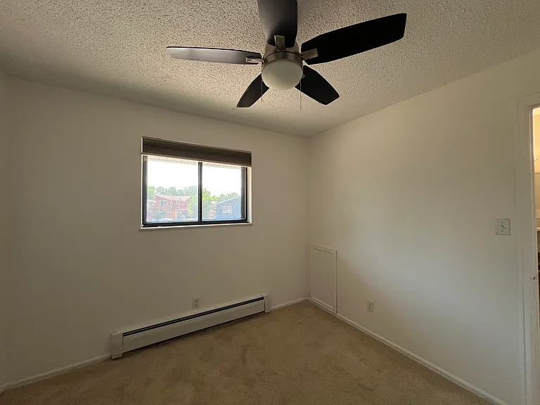 Bedroom, new paint, carpeting and will have a new blind.