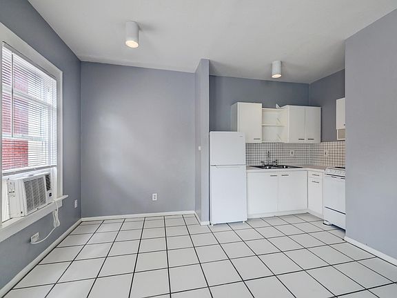 The dining area is set nicely off the kitchen with ample natural light.