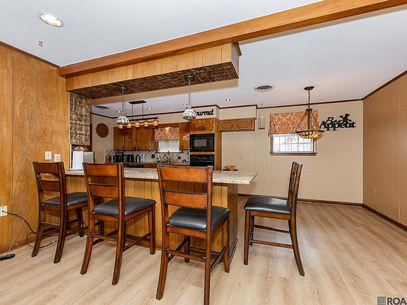4th image of 5442 Howell Park Ave