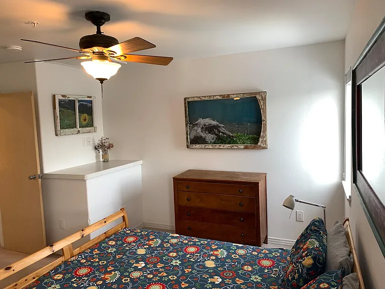 Two large dressers in bedroom