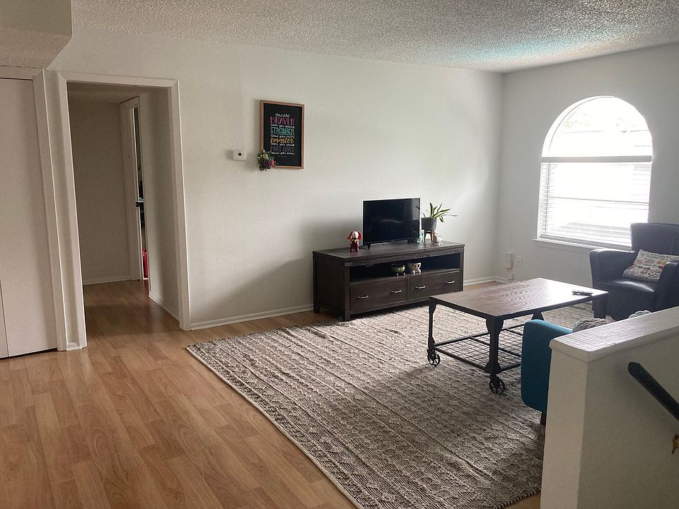 Enter your spacious living room with tons of natural light