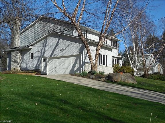Side view of home high on a hill overlooking Chagrin Valley