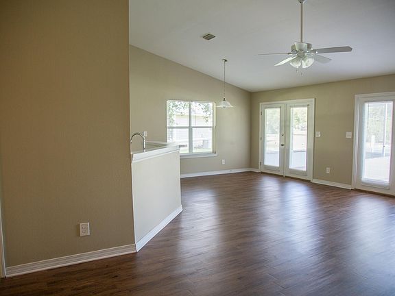 Open floor plan with vaulted ceilings