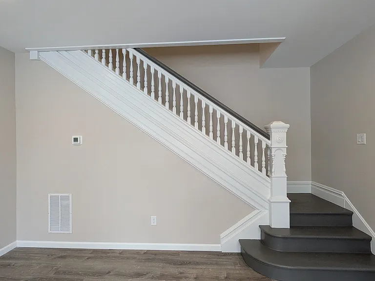 extra high ceilings and a historic staircase