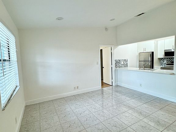 View from Front Door into the Kitchen - Living area