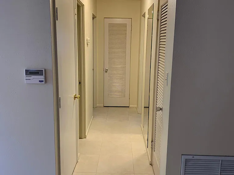 Hall way to hall bath and two bedrooms