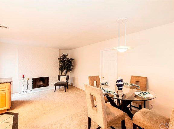 Dining/family room area with gas fireplace