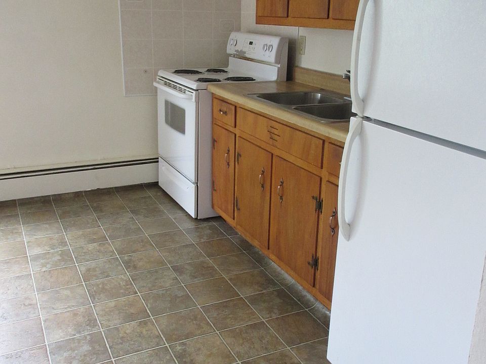Kitchen view of older not newer LVT floor